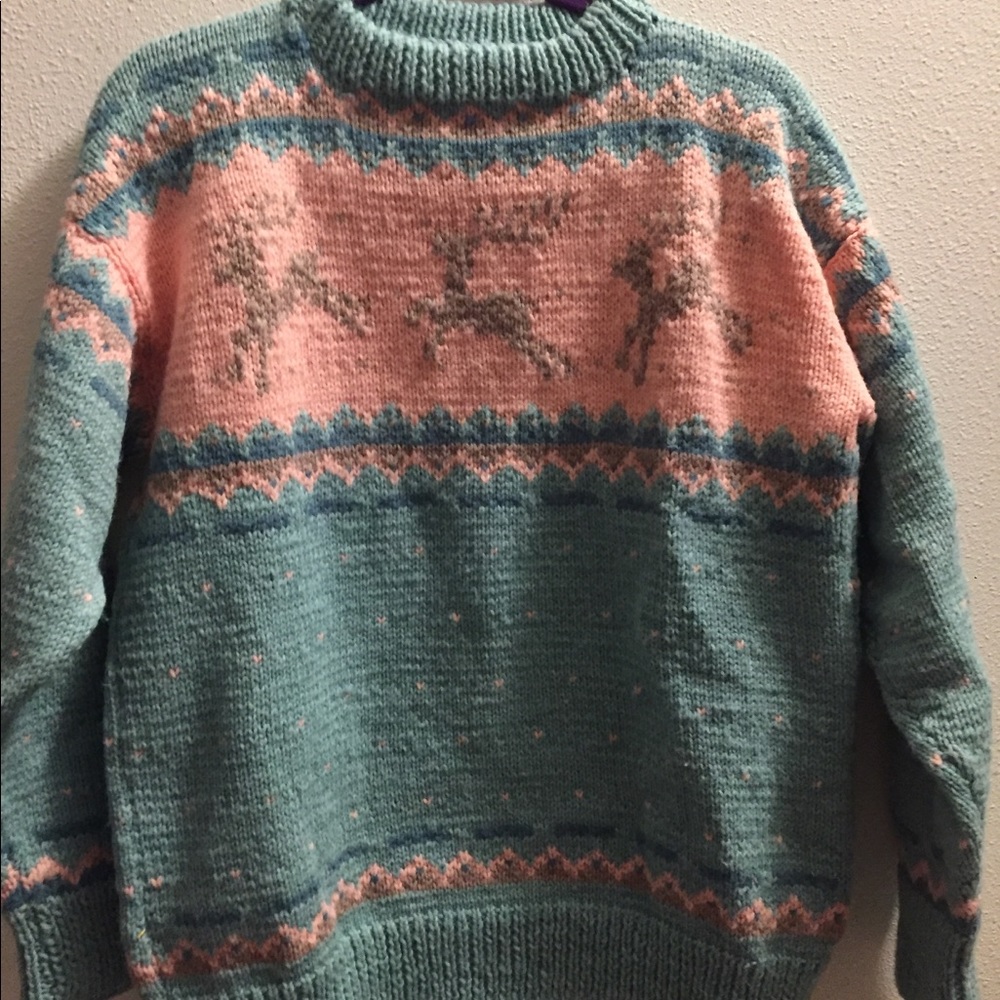 Handmade sweater with reindeer.
